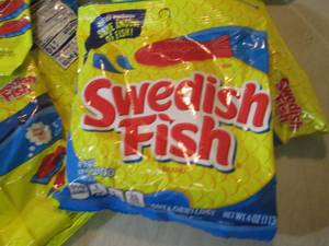 lot 101 image: 12 Bags of Swedish Fish Candy Dates...