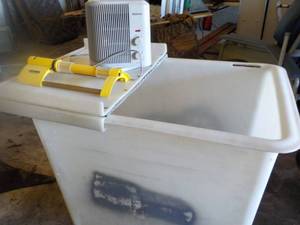 lot 42 image: Dumpster, Homes Heater, and Sprinkl...