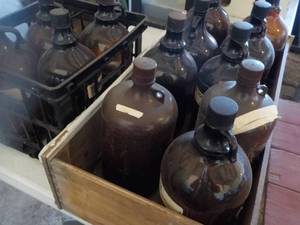 lot 51 image: Brown Glass Storage Jugs...