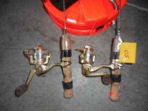 lot 30 image: Two Small Ice Fishing Poles  2 Frabill 10 Tip-ups