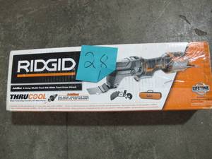 lot 28 image: RIDGID 4 Amp Corded JobMax Multi-Tool with Tool-Free Head Model # R28602