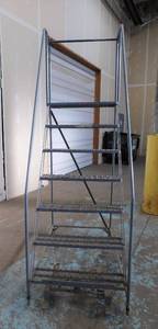 lot 22 image: Rolling Industrial 7 Step Ladder