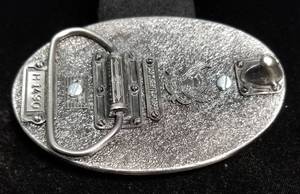 lot 03 image: 1921 MORGAN SILVER DOLLAR IN ENGRAVED BELT BUCKLE