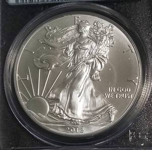 lot 48 image: 2012 AMERICAN SILVER EAGLE 1 TROY OZ. .999 FINE SILVER MS70 PCGS FIRSTSTRIKE