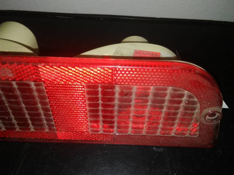 lot 49 image: Polaris snowmobile taillight housing and lens - new.