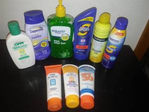 lot 241 image: Sunscreen bottles & Sprays, mostly full, several NEW.