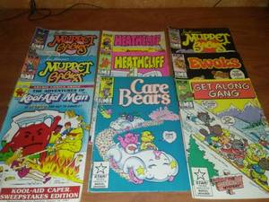 lot 279 image: Misc. comics. 4 #1 Issues - Get Along Gang, Ewoks, Care Bears, Muppet Babies $ more.