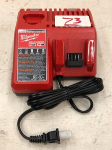 lot 73 image: Milwaukee M18  M12 Battery Charger...