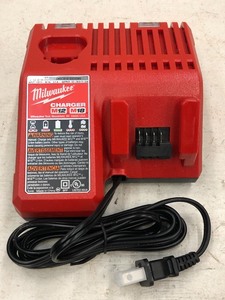 lot 74 image: Milwaukee M18  M12 Battery Charger...