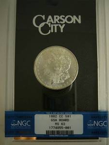 lot 52 image: 1882 CC Morgan Silver Dollar Graded MS63 NGC In Box