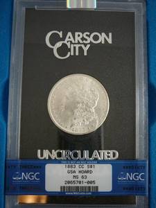 lot 53 image: 1883 CC Morgan Silver Dollar Graded MS63 NGC In Box