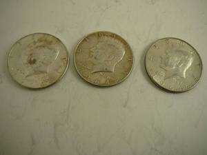 lot 69 image: 3 - 1964 Kennedy Half Dollars