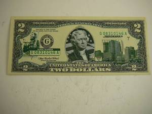 lot 77 image: 2 Dollar Note Green Seal Overlaid With Paul Bunyan & City Of MPLS