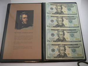 lot 114 image: 2004A World Reserve Uncut Sheet Of 4 $20 Star Notes In Folder