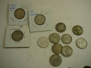 lot 122 image: 12 Canadian Silver Quarters