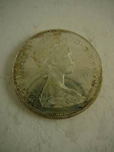 lot 135 image: 1965 Canadian Silver Dollar