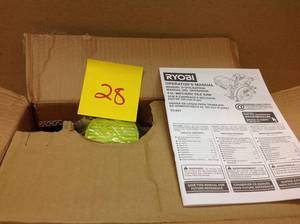 lot 28 image: RYOBI 4 in. Tile Saw open box in very good condition