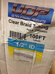 lot 159 image: UDP 12 in. I.D. x 34 in. O.D. x 100 ft. Clear Braided Vinyl Tubing with Dispenser Boxin good condition