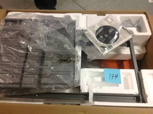 lot 174 image: Ridgid 9 Amp Corded 7 in. Wet Tile Saw with Stand in good condition