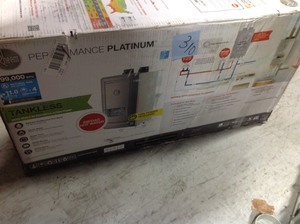 lot 310 image: Rheem Performance Platinum 11 GPM Natural Gas High Efficiency Indoor Recirculating Tankless Water Heater in good conditions