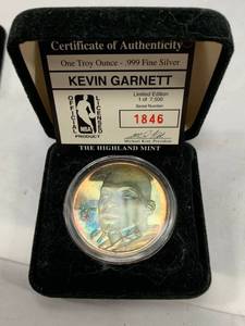 lot 12 image: Vintage Limited Edition Kevin Garnett 1oz. .999 Silver