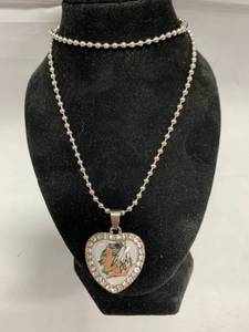 lot 28 image: UND Fighting Sioux Necklace