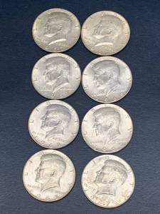 lot 45 image: Lot of 8 Kennedy Half Dollars