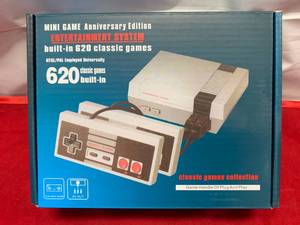 lot 72 image: Mini Entertainment Game System with 620 Games (new in box)