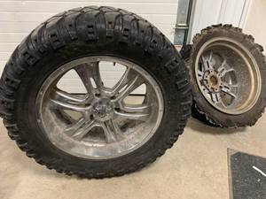 lot 87 image: One Mickey Thompson Tire  & 2 Granite Alloy Rims 20