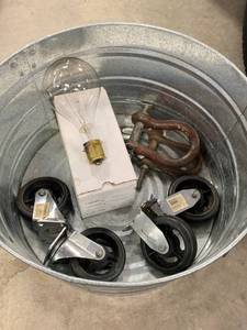 lot 111 image: Galvanized Bucket, 2 Shackles, Lightbulb, Casters