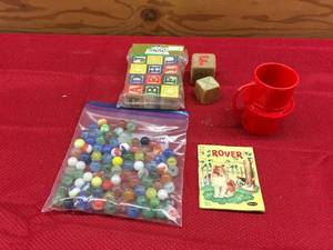 lot 136 image: Bag Of Marbles, Letter Blocks,  & Rover Book