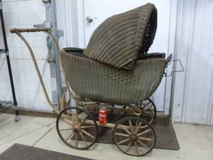 lot 24 image: Antique Baby Buggy