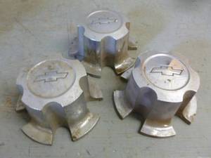 lot 190 image: Chevy Hub Caps