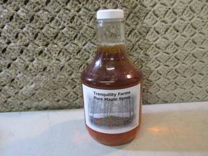 lot 42 image: Bottle of Tranquility Farms Pure Ma...