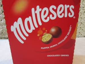 lot 201 image: Box of 18 Bags of Maltesers Candy B...