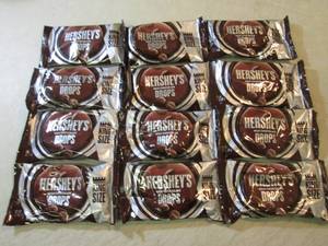lot 205 image: 12 King Size Bags of Hersheys Milk ...