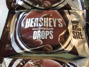 lot 206 image: 12 King Size Bags of Hersheys Milk ...