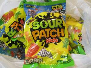 lot 222 image: 8 Bags of Sour Patch Kids Candy Bes...