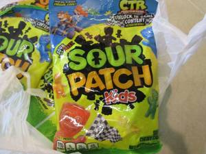 lot 229 image: 8 Bags of Sour Patch Kids Candy Bes...