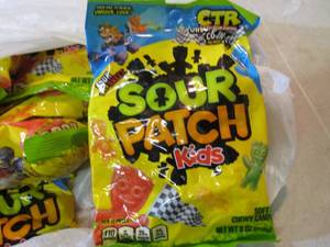 lot 230 image: 8 Bags of Sour Patch Kids Candy Bes...