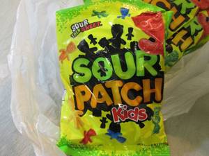 lot 232 image: 8 Bags of Sour Patch Kids Candy Bes...