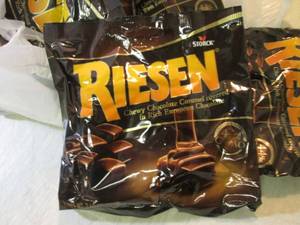 lot 233 image: 12 Bags of Riesen Candy Best by Jul...