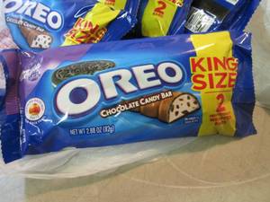 lot 238 image: 12 Oreo Candy Bars Best by Jan 2019...