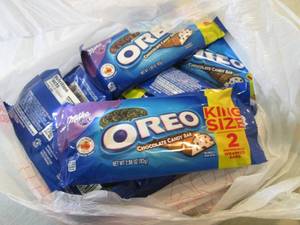 lot 241 image: 12 Oreo Candy Bars Best by Jan 2019...