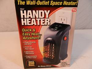 lot 23 image: New Handy Heater Space Heater