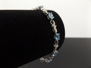 .925 Sterling Silver Diamond Accented Topaz Bracelet