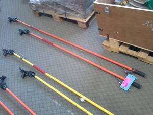 lot 151 image: Lot of (2) Extension Poles with Cable Release