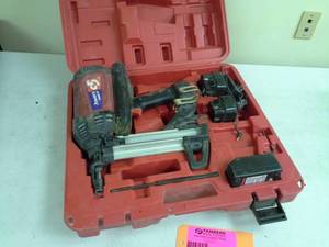 lot 532 image: Powers Fasteners Trak-It Tool C5, Batteries, Charger, Case, Manual