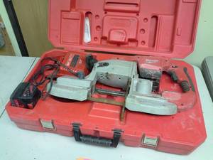 lot 535 image: Milwaukee Heavy Duty 28VDC Cordless Band Saw, Battery, Charger, Case