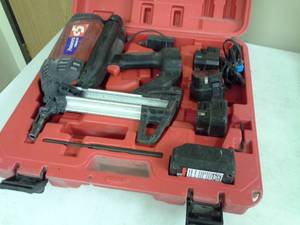 lot 541 image: Powers Fasteners Trak-It Tool C5, Batteries, Charger, Case, Manual